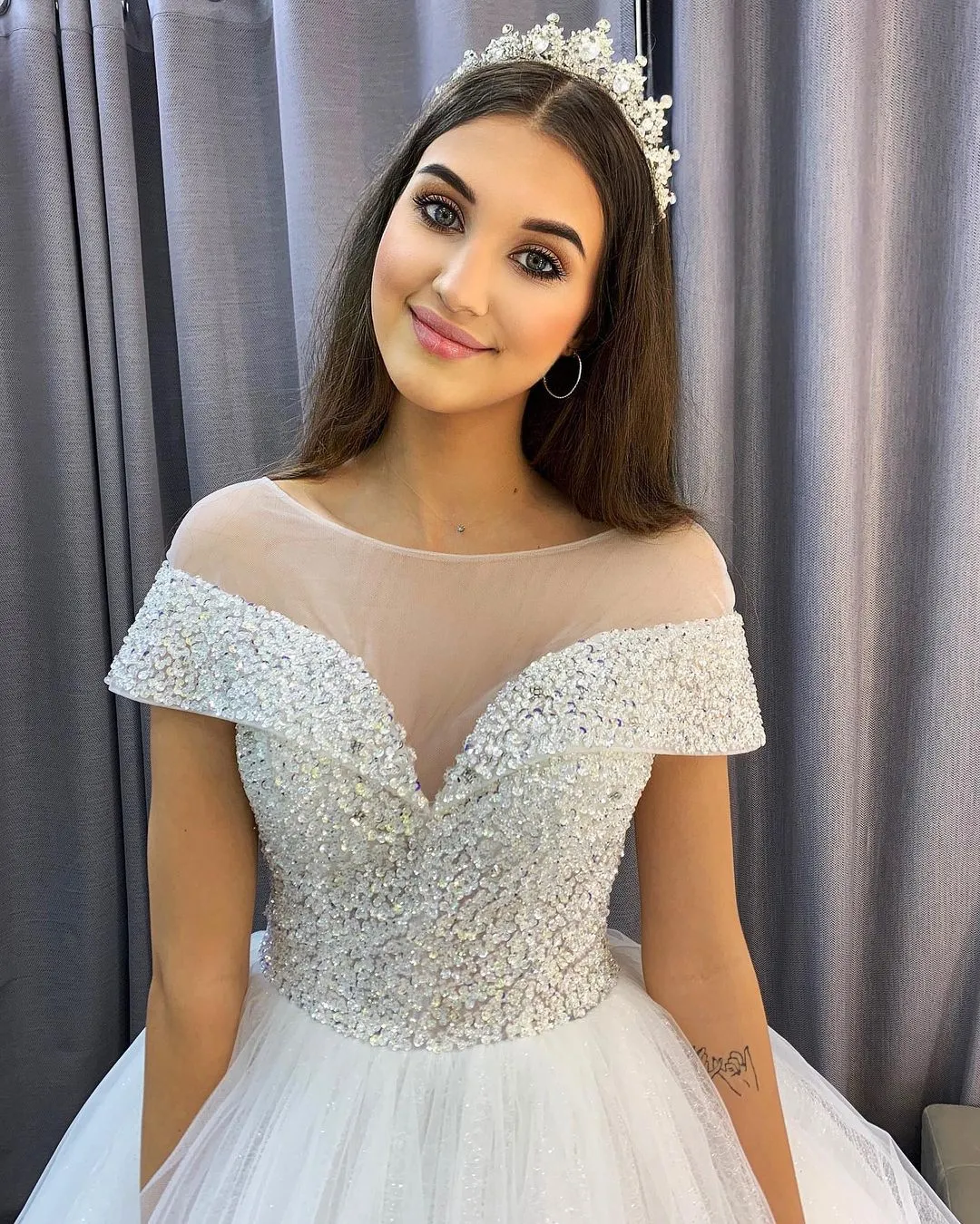 Elegant A-Line Bateau Neck Crystal Train Wedding Dress with Sequins and Tulle